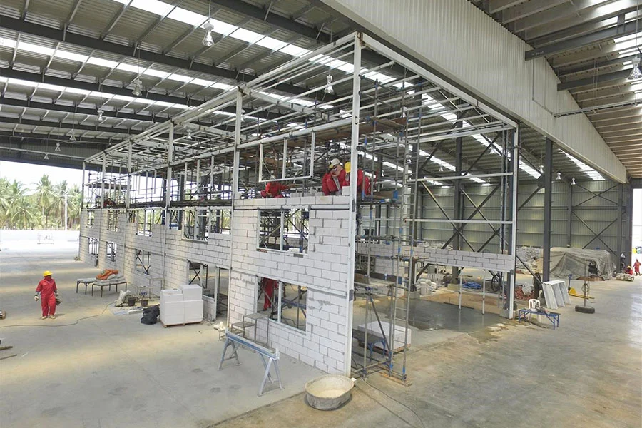 The Ultimate Guide to Steel Portal Frame Structures: Design, Costs, and Global Applications插图1 Paint-shop-in-Thailand3